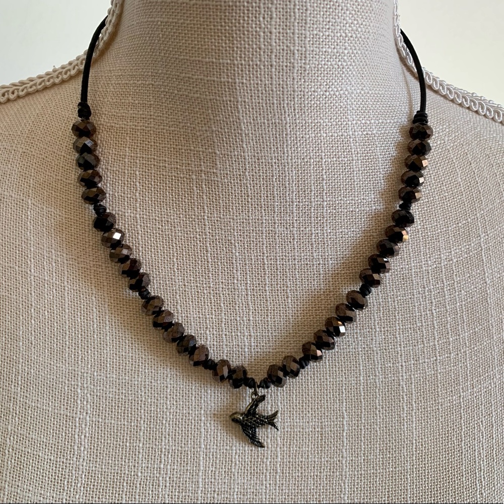 Bird charm necklace